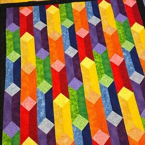 Vintage color block handmade quilt. 80”x73” rainbow colors, green backing.